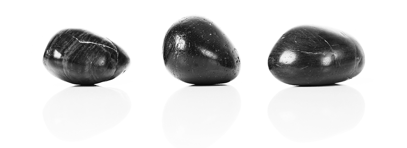 A group of black stones

AI-generated content may be incorrect.